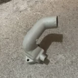 Coude à eau sur culasse moteur